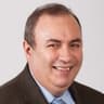 John Tumazos